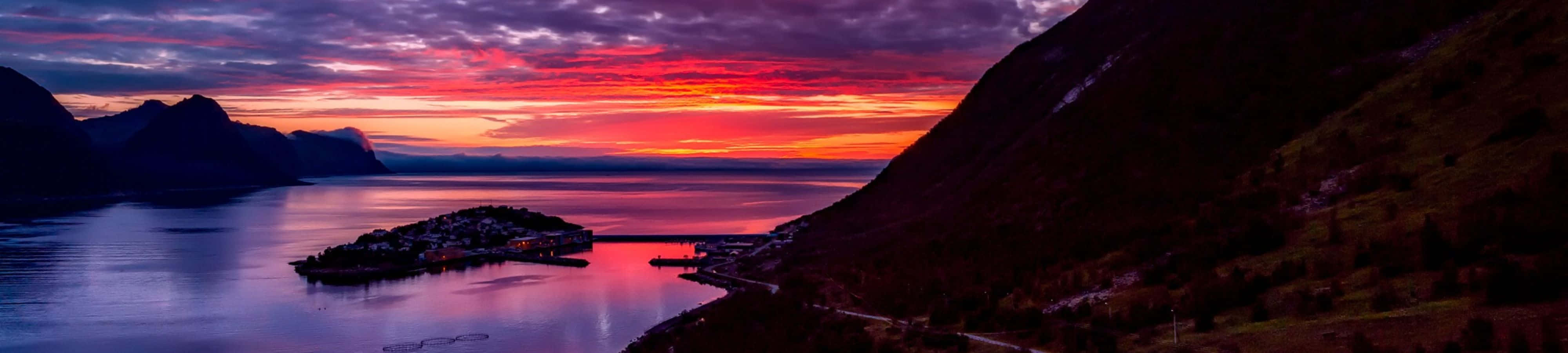 Un vibrante amanecer ilumina el paisaje Fondos de pantalla