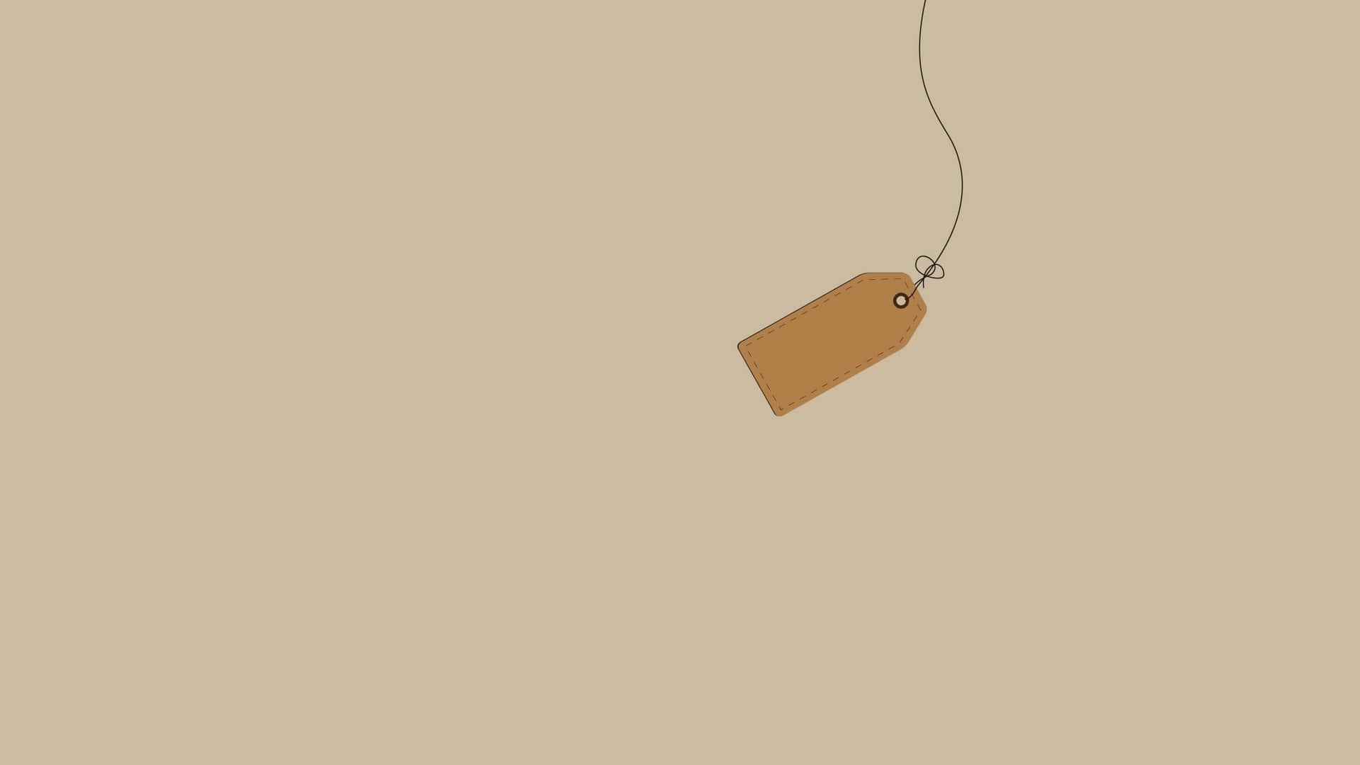 una etiqueta marrón colgando de un cordón Fondos de pantalla