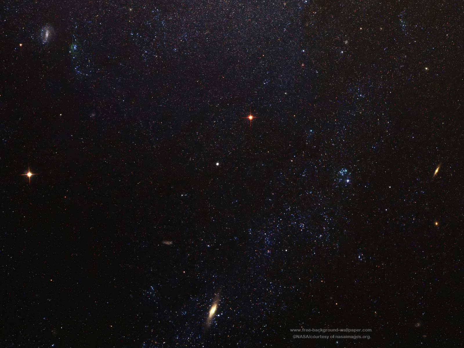 "Una hermosa galaxia espiral con estrellas esparcidas por su vasta extensión" Fondos de pantalla