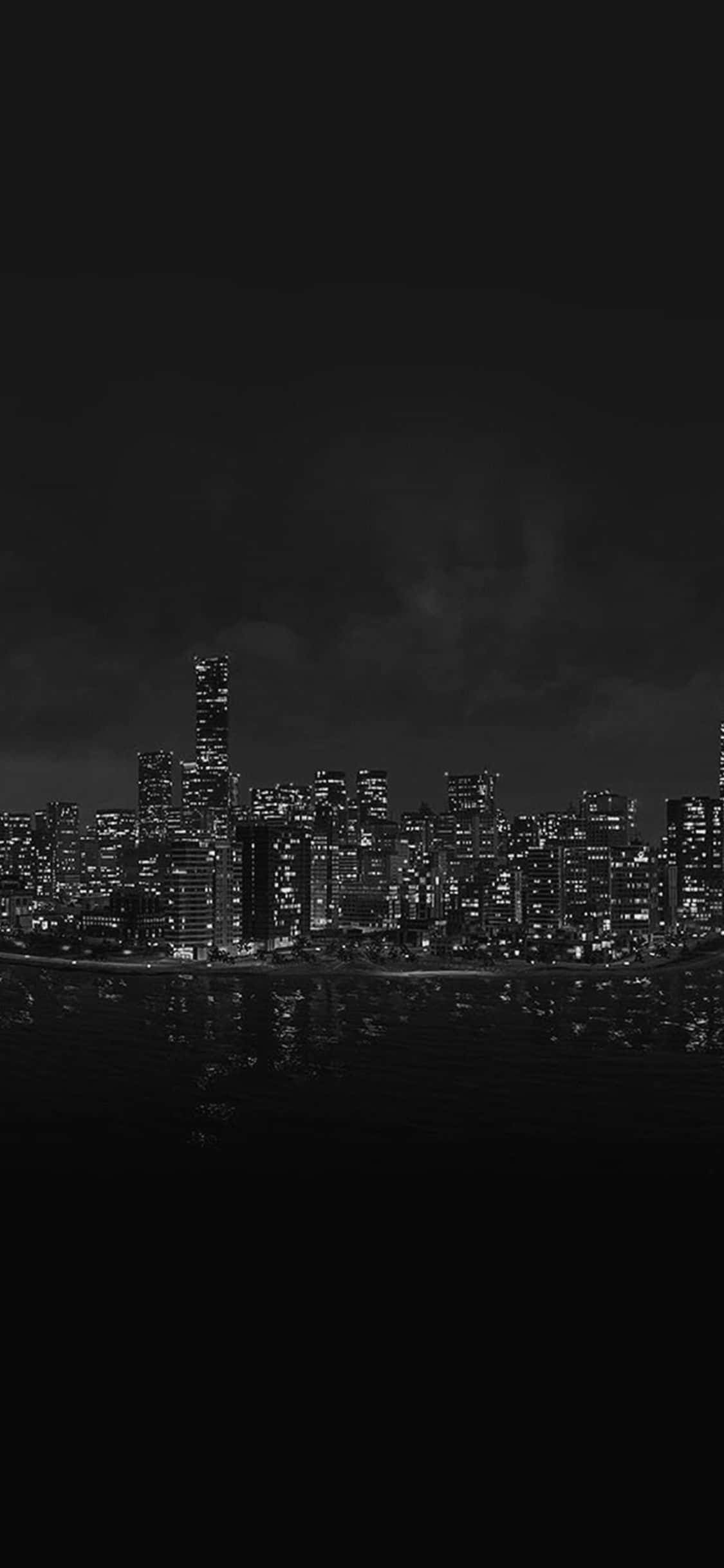 una imagen en blanco y negro del horizonte de una ciudad Fondos de pantalla