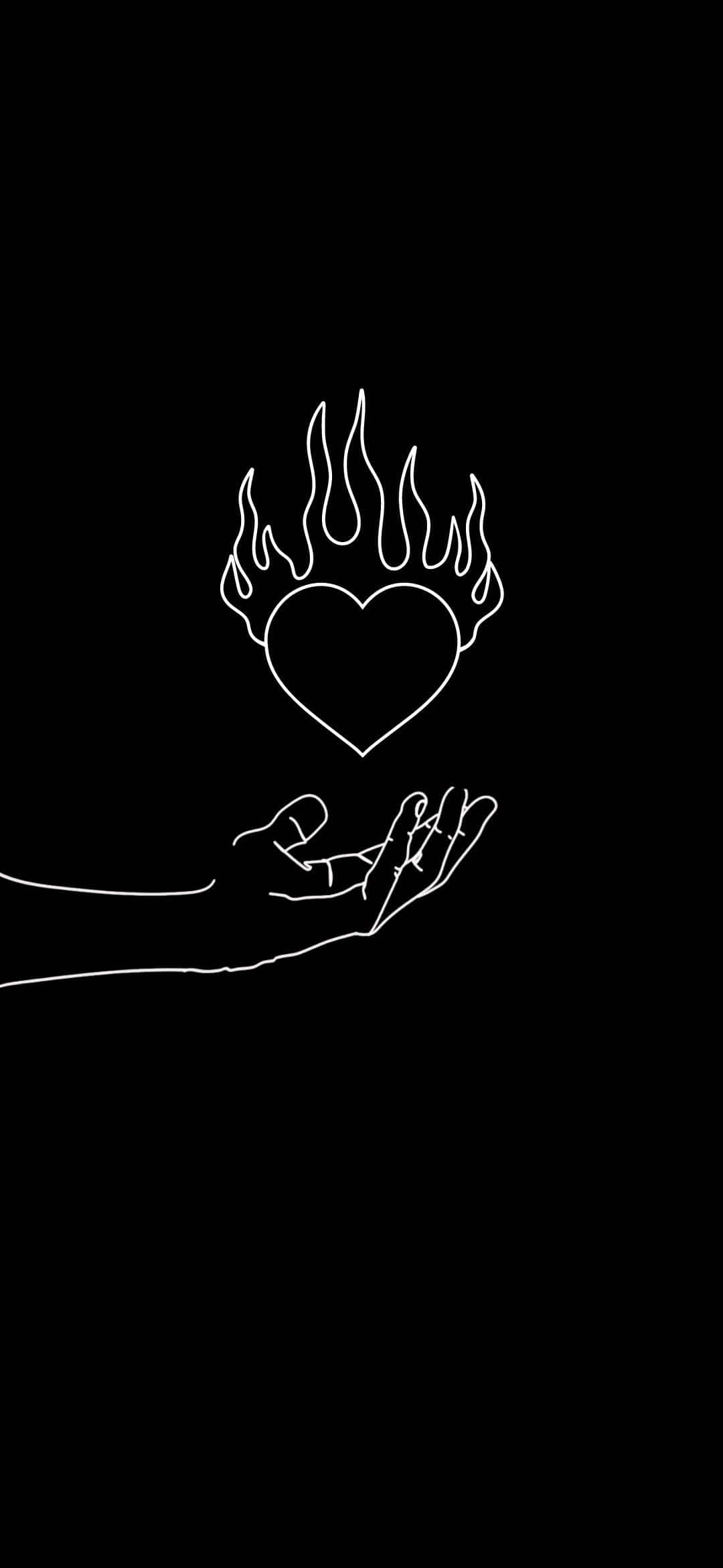 una mano sosteniendo un corazón con llamas Fondos de pantalla
