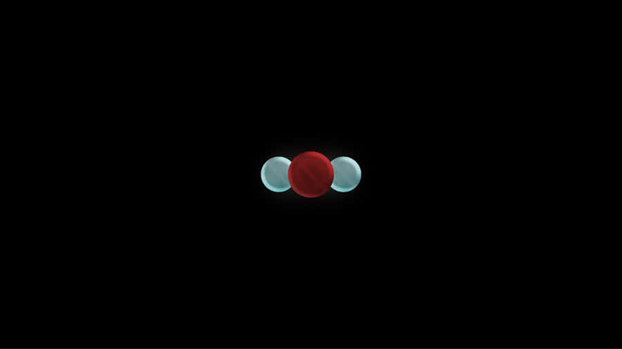 una pelota roja y azul sobre un fondo negro Fondos de pantalla