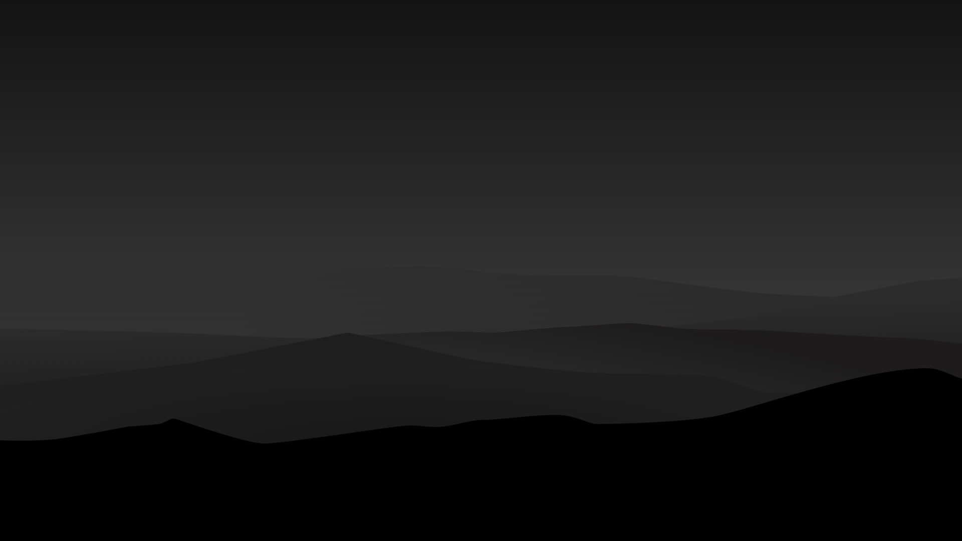 una silueta negra de montañas con un cielo oscuro Fondos de pantalla