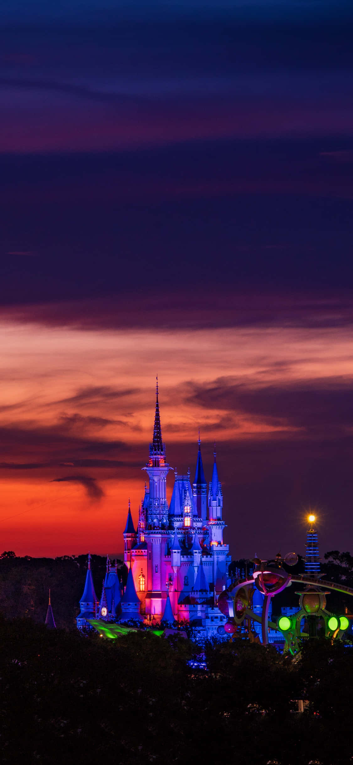 Una toma ilustrada de Disney World en un iPhone moderno Fondos de pantalla