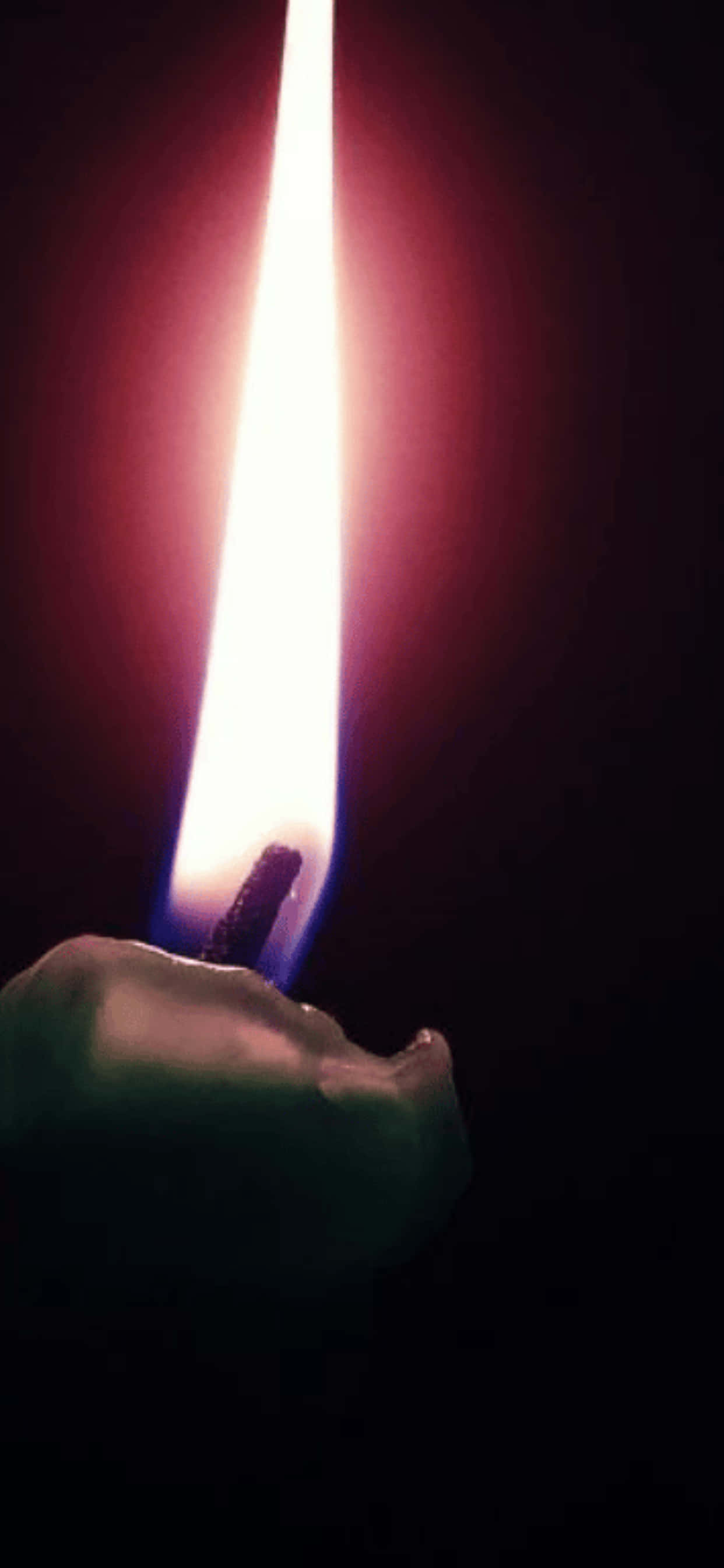 una vela encendida en la oscuridad Fondos de pantalla