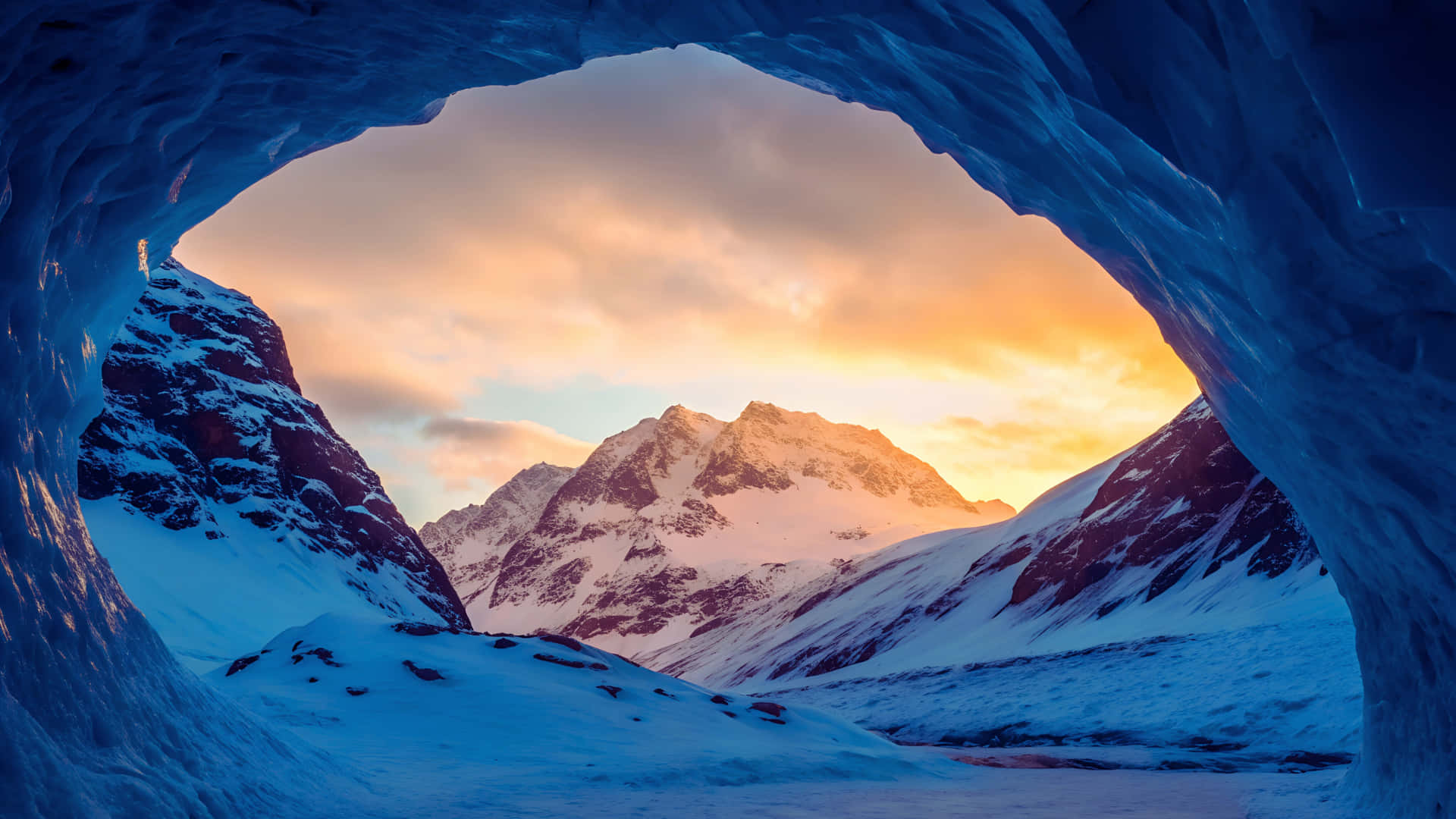 hielo,cueva,montaña,nieve,glaciar,invierno,paisaje,naturaleza,frío,azul,naranja,cielo,atardecer,amanecer,vista,hermoso,prístino,congelado,salvaje,cima