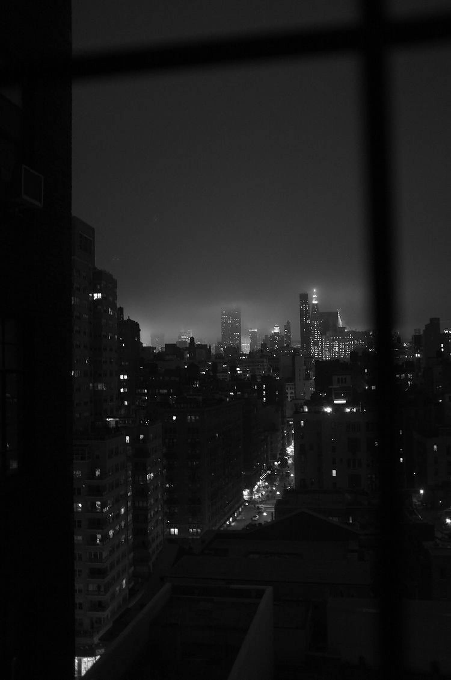 Vista de ventana de ciudad oscura Fondos de pantalla