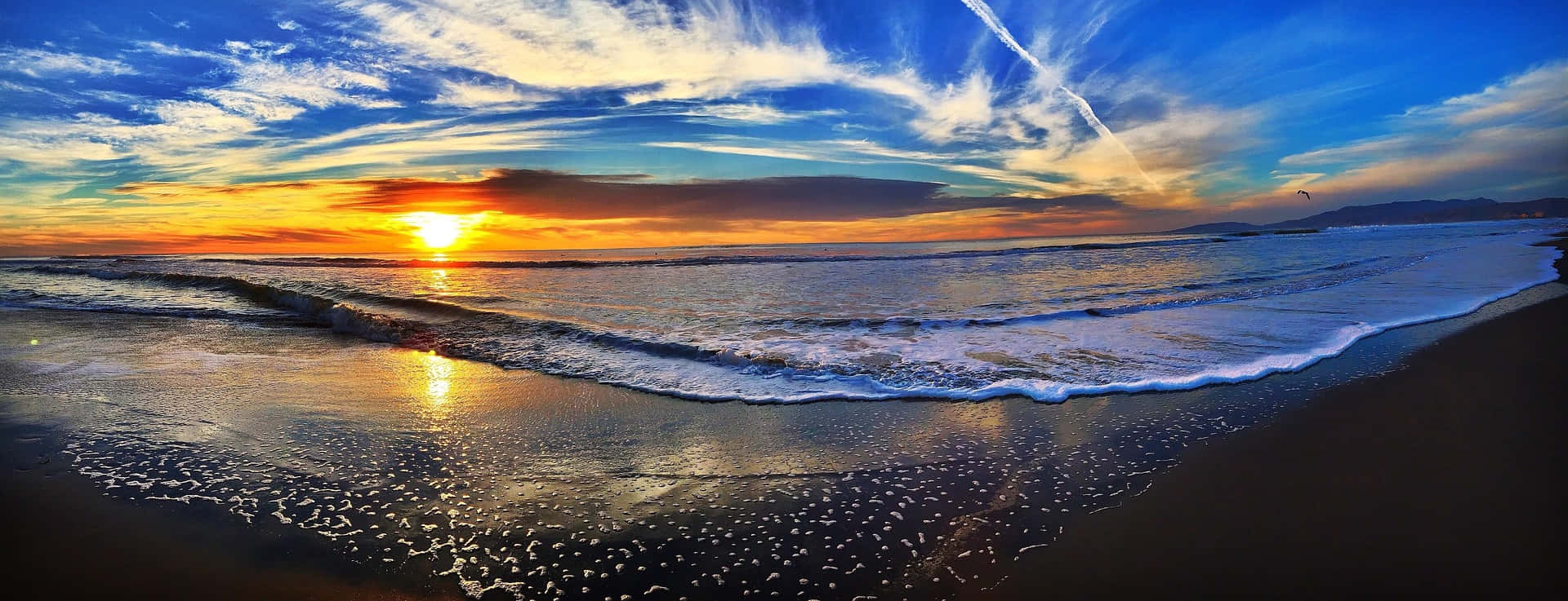 Vista panorámica de la playa al atardecer Fondos de pantalla