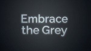 Cita inspiradora 'Abraza el Gris' sobre un degradado gris oscuro.