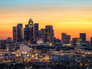 Fondo de pantalla de atardecer amarillo naranja en Los Ángeles — Atardecer en el bulevar Fondos de pantalla