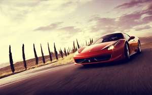 Fondo de pantalla de un Ferrari 458 Italia rojo en movimiento.