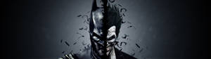 Batman y Joker como uno solo en fondo de pantalla gris para dos monitores