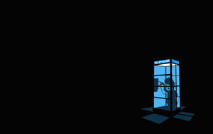 Fondo de pantalla de persona simple en una cabina telefónica