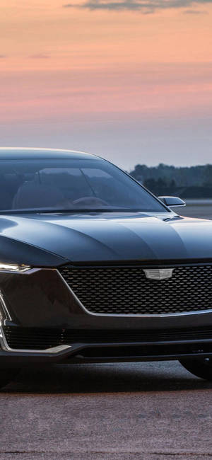 Fondo de pantalla Cadillac al atardecer desde iPhone — iPhone 15 Pro Max Fondos de pantalla