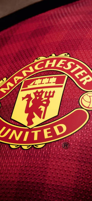Fondo de pantalla de camiseta del Manchester United — iPhone 14 Plus Fondos de pantalla