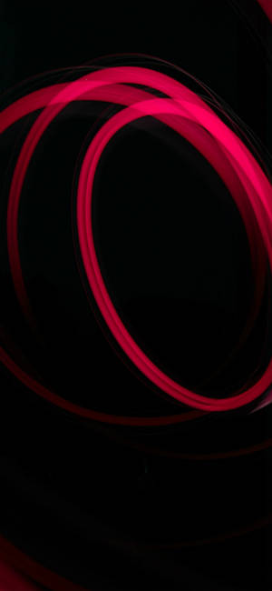 Fondo de pantalla de círculos rojos brillantes — iPhone 15 Fondos de pantalla