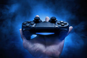Fondo de pantalla de control de videojuegos en mano