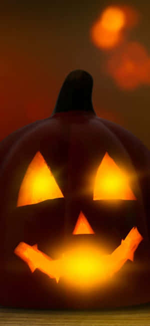 Dale un Toque de Diversión Espeluznante a tu Teléfono con un Fondo de Pantalla de Halloween con Estilo para iPhone — iPhone 12 Fondos de pantalla
