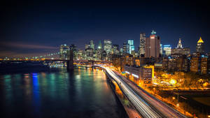 Fondo de pantalla de paisaje urbano de luces brillantes de Nueva York