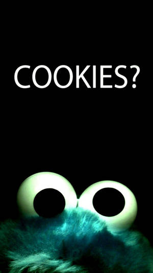 Fondo de pantalla de bloqueo con Cookie Monster y galletas.