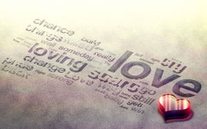 Diferentes palabras de amor como 'amando' escritas sobre una superficie gris con un corazón rojo 3D brillante al lado.