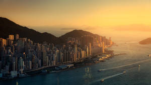 Fondo de pantalla del hermoso paisaje urbano de Hong Kong con atardecer. — 1600x900 Fondos de pantalla
