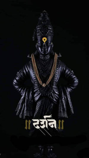 Estatua de madera tallada de Vitthal