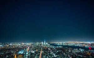 Fondo de pantalla de brillantes luces nocturnas de la ciudad