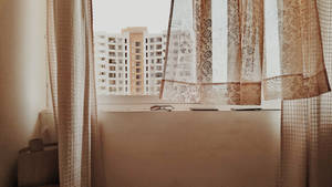 Fondo de pantalla de ventana estética marrón para laptop