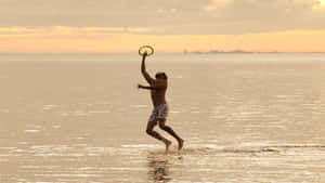Fondo de Frisbee 1440p — Atardecer en la playa Fondos de pantalla