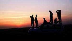 Fondo de pantalla de foto grupal de BTS al atardecer — Bts foto grupal GIF Fondos de pantalla
