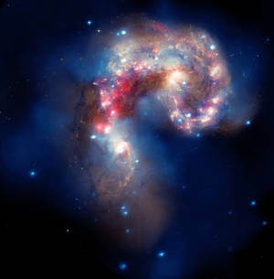 Fondo de pantalla increíble de Galaxia Irregular colorida en el espacio exterior