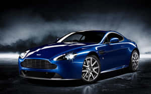 Impresionante Aston Martin DB9 en movimiento por una ruta escénica — Steam Deck OLED Fondos de pantalla