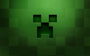 Fondo de pantalla pixelado de la cara de un creeper verde oscuro de Minecraft