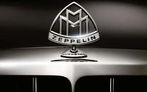 Logotipo Elegante de Coche sobre Fondo Rojo Degradado — MacBook Air M1 Fondos de pantalla