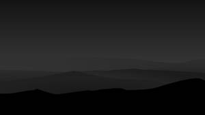Fondo de pantalla minimalista de tonos de montañas negras