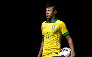 Fondo de pantalla de un joven Neymar Jr. con la camiseta de la CBF.