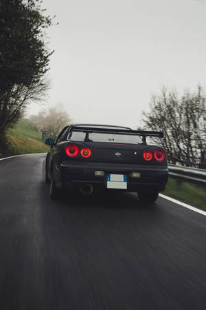 bmw m3 negro en la carretera