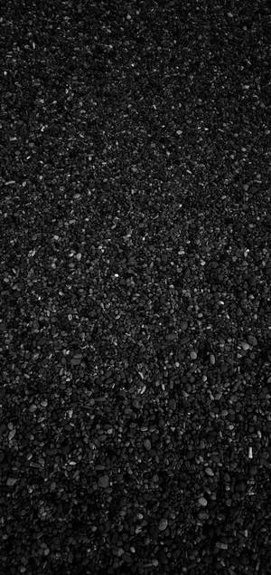 Fondo de pantalla de numerosas piedras de mar en diferentes colores, formas y tamaños — iPhone X Fondos de pantalla