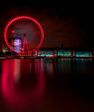 Fondo de pantalla del London Eye con sus hermosas y brillantes luces rojas. — Galaxy Z Fold 6 Fondos de pantalla