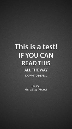 Fondo de pantalla de bloqueo para iPhone con la frase 'Esto es una prueba'.