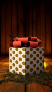 Gran regalo de lunares con moño rojo en suelo rústico iluminado por el fuego. — Regalos de Navidad Fondos de pantalla