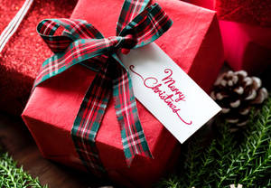 Fondo de pantalla de elegante regalo rojo de Navidad — Rojo navidad Fondos de pantalla