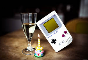 Fondo de pantalla de réplica de Game Boy con vidrio y pastel
