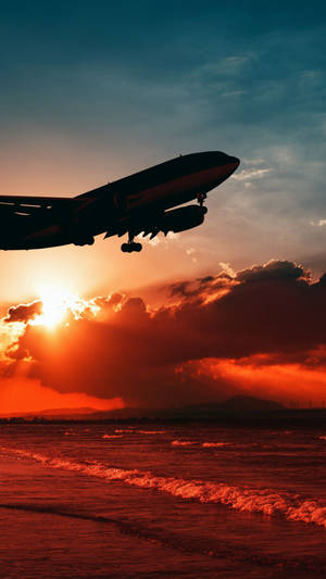 Silueta de avión en vuelo Android — Atardecer Fondos de pantalla