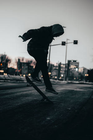 Fondo de pantalla Skater Haciendo Heelflip.