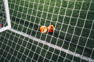 Fondo de escritorio de estadio de fútbol con red.