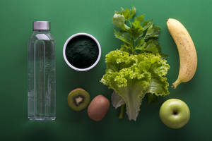 variedad de frutas y verduras sobre fondo verde — Estética verde GIF Fondos de pantalla