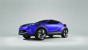 Vista Lateral de Toyota CH-R Azul 4K — Coche en movimiento Fondos de pantalla